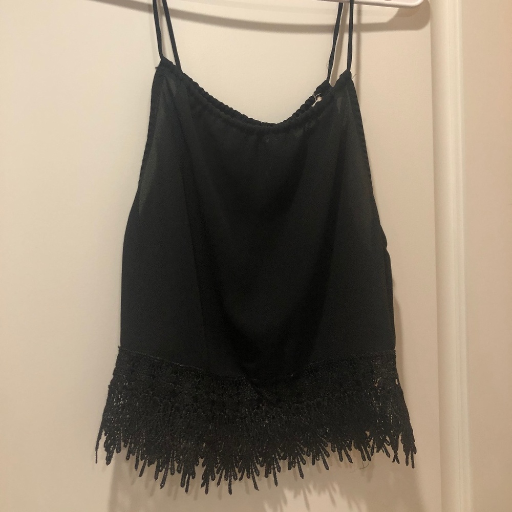 String at store black crop tank with lace design